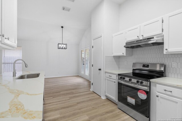 6610 Quail Lk, San Antonio, TX 78244 - kitchen featuring stainless steel electric range oven, a sink, under cabinet range hood, tasteful backsplash, and light wood-style floors