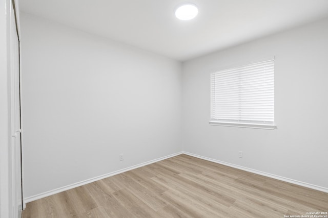 6610 Quail Lk, San Antonio, TX 78244 - spare room featuring light wood-type flooring and baseboards