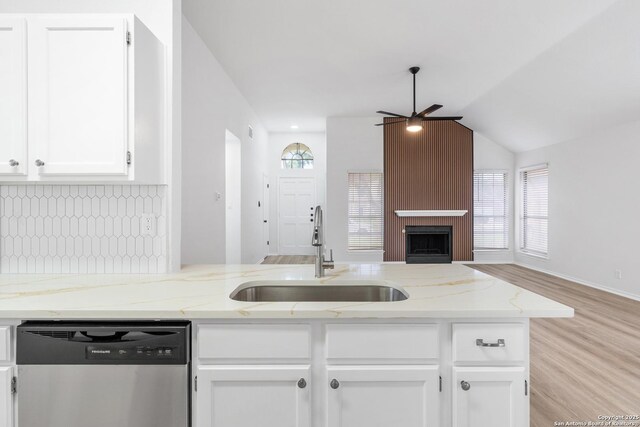 6610 Quail Lk, San Antonio, TX 78244 - kitchen featuring dishwasher, a sink, white cabinets, ceiling fan, and open floor plan