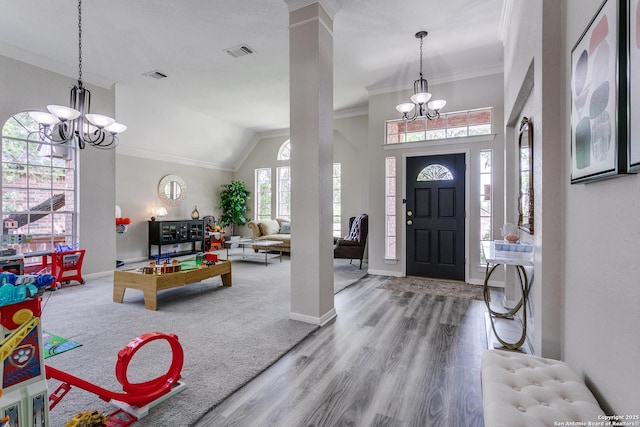 13019 Rambling Oak, San Antonio, TX 78232 - entryway with a chandelier, ornamental molding, wood finished floors, and baseboards