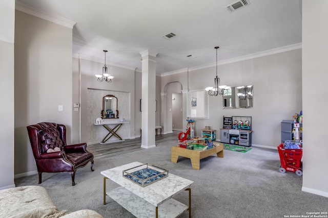 13019 Rambling Oak, San Antonio, TX 78232 - living room featuring a chandelier, crown molding, carpet, ornate columns, and baseboards