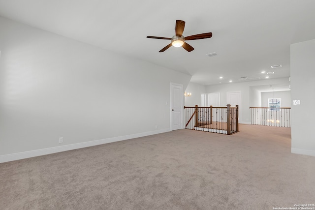 6827 Bella Verso, San Antonio, TX 78256 - spare room with recessed lighting, ceiling fan, carpet, baseboards, and a chandelier
