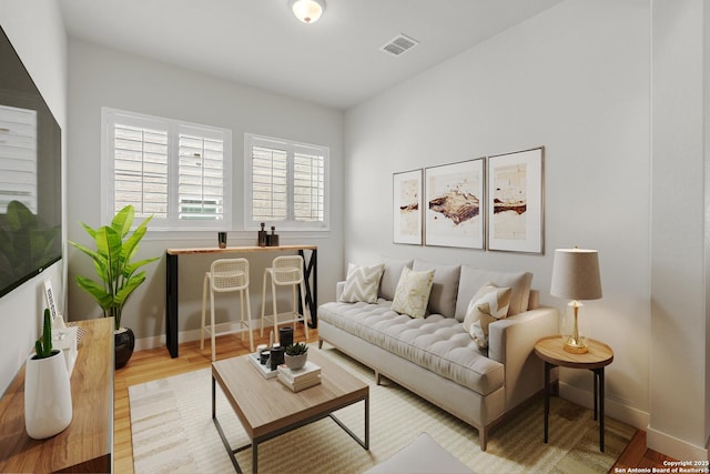 6827 Bella Verso, San Antonio, TX 78256 - living area featuring wood finished floors and baseboards