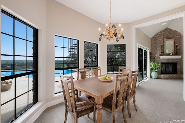 14706 War Admiral, San Antonio, TX 78248 - dining room featuring a chandelier, vaulted ceiling, a fireplace, and tile patterned flooring