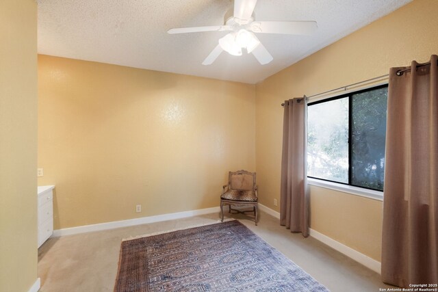 14706 War Admiral, San Antonio, TX 78248 - unfurnished room featuring light colored carpet, ceiling fan, a textured ceiling, and baseboards