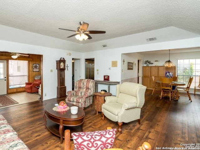 5823 Archwood, San Antonio, TX 78239 - living area featuring ceiling fan, a textured ceiling, and wood finished floors