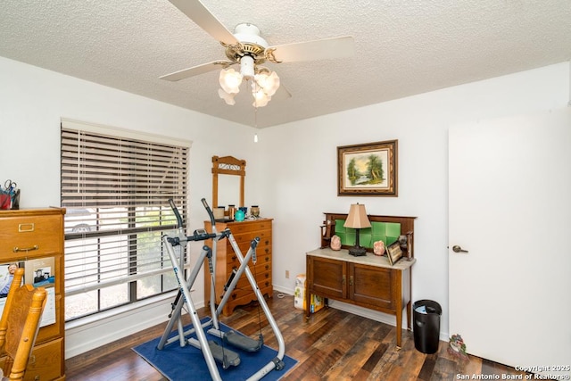 5823 Archwood, San Antonio, TX 78239 - workout area featuring wood finished floors, ceiling fan, a textured ceiling, and baseboards