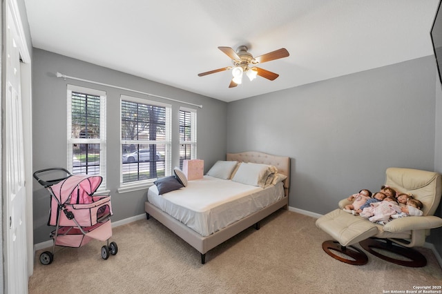 13014 Essen, Helotes, TX 78023 - carpeted bedroom featuring baseboards and ceiling fan