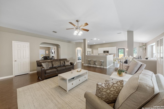 13014 Essen, Helotes, TX 78023 - living area with arched walkways, baseboards, a ceiling fan, wood finished floors, and recessed lighting