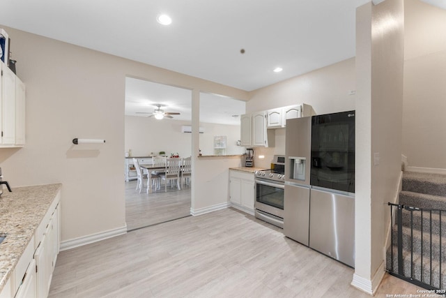8608 S Foster Rd, San Antonio, TX 78222 - kitchen featuring appliances with stainless steel finishes, a ceiling fan, light wood-type flooring, white cabinetry, and recessed lighting