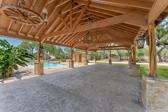 8608 S Foster Rd, San Antonio, TX 78222 - view of patio / terrace featuring an outdoor pool