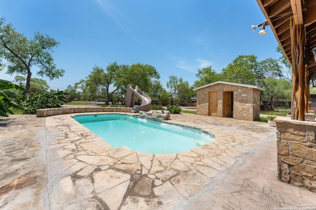8608 S Foster Rd, San Antonio, TX 78222 - outdoor pool with a water slide and a patio area