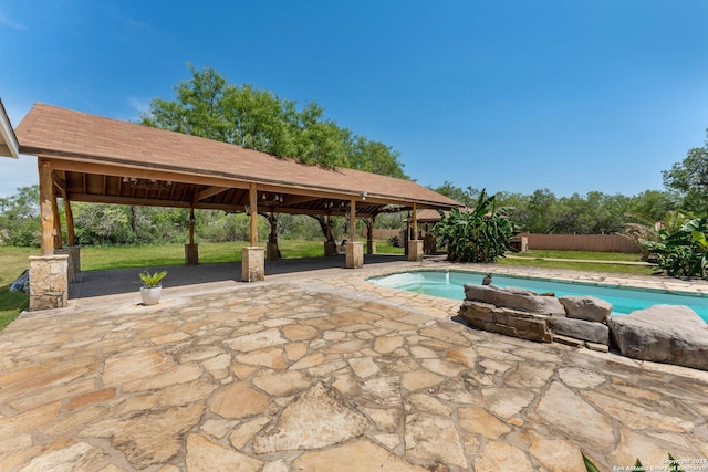 8608 S Foster Rd, San Antonio, TX 78222 - outdoor pool with a gazebo, a patio area, and a lawn