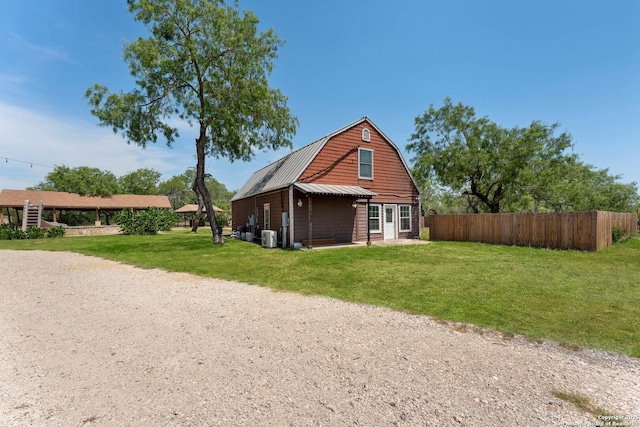 8608 S Foster Rd, San Antonio, TX 78222 - back of property featuring a gambrel roof and metal roof