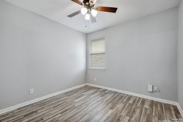 1947 Walter Raleigh, Windcrest, TX 78239 - spare room featuring wood finished floors, baseboards, and a ceiling fan