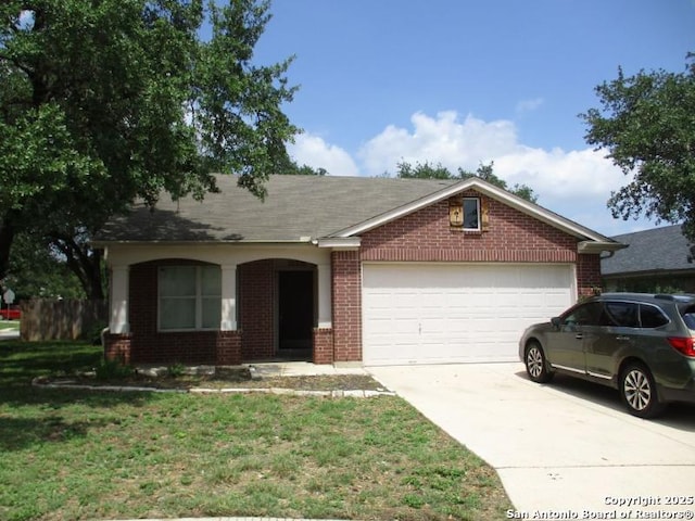 20326 Liatris, San Antonio, TX 78259 - ranch-style home featuring brick siding, driveway, an attached garage, and a front yard