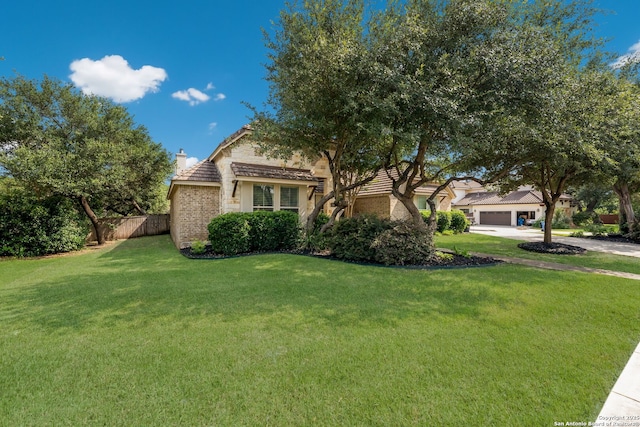 314 Regent Cir, Shavano Park, TX 78231 - obstructed view of property featuring a chimney, a garage, driveway, and stone siding