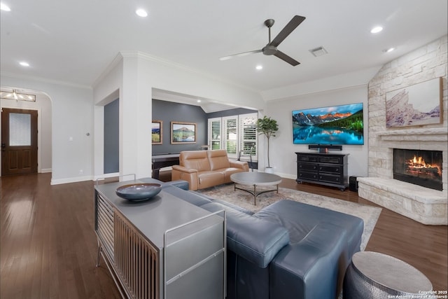 314 Regent Cir, Shavano Park, TX 78231 - living room featuring ceiling fan, wood finished floors, ornamental molding, a stone fireplace, and baseboards
