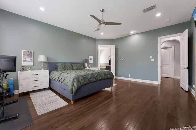 314 Regent Cir, Shavano Park, TX 78231 - bedroom featuring wood finished floors, arched walkways, a ceiling fan, baseboards, and recessed lighting