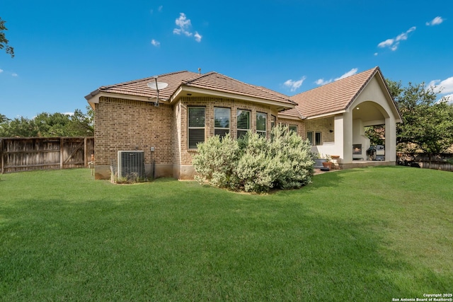 314 Regent Cir, Shavano Park, TX 78231 - back of house featuring central air condition unit, brick siding, and a tile roof