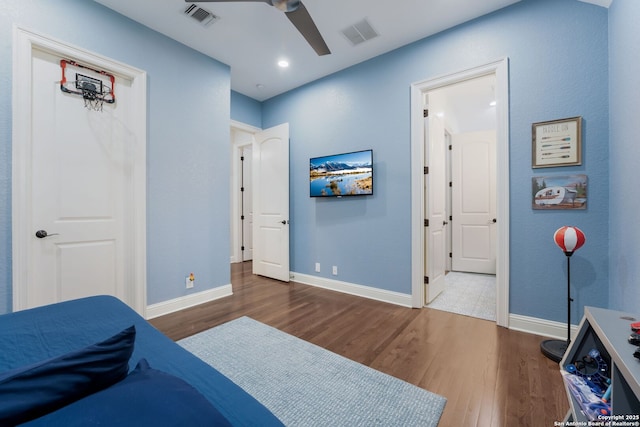 314 Regent Cir, Shavano Park, TX 78231 - bedroom with wood finished floors, baseboards, a ceiling fan, and recessed lighting