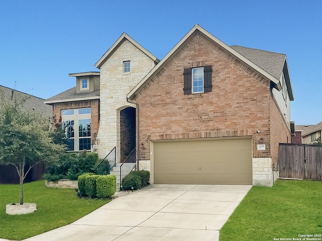 2035 Tillman Park, San Antonio, TX 78253 - view of front of property featuring brick siding, driveway, stone siding, and roof with shingles
