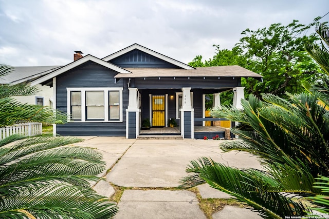 128 Blanco, San Antonio, TX 78212 - view of front of property featuring covered porch and a chimney
