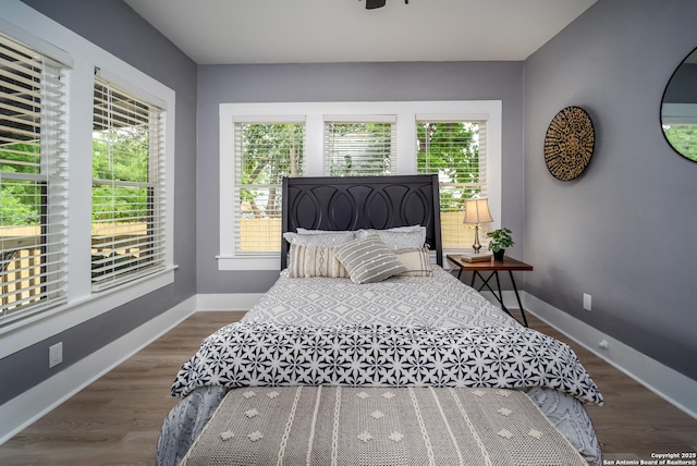 128 Blanco, San Antonio, TX 78212 - bedroom featuring baseboards and wood finished floors