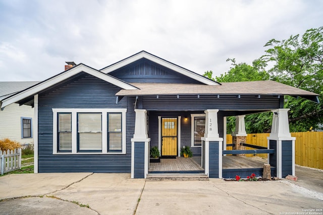 128 Blanco, San Antonio, TX 78212 - view of front of house with a porch and a chimney