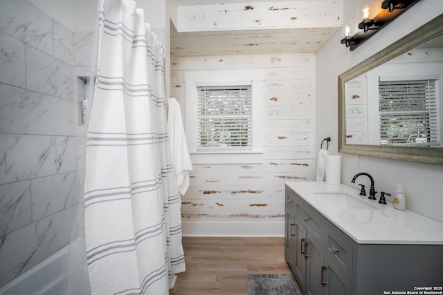 128 Blanco, San Antonio, TX 78212 - bathroom with vanity, shower / bath combination with curtain, and wood finished floors