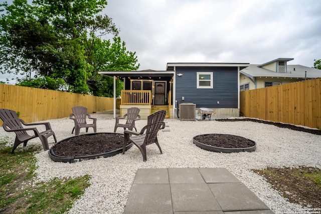 128 Blanco, San Antonio, TX 78212 - fenced backyard featuring a fire pit, central AC, and a patio
