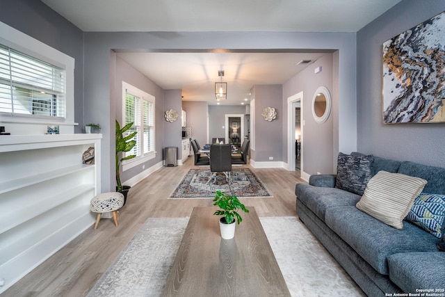 128 Blanco, San Antonio, TX 78212 - living room featuring light wood-style flooring and baseboards