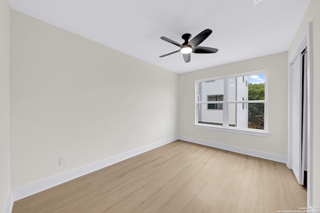 11710 Vance Jackson Rd Unit 801, San Antonio, TX 78230 - empty room with light wood finished floors and a ceiling fan