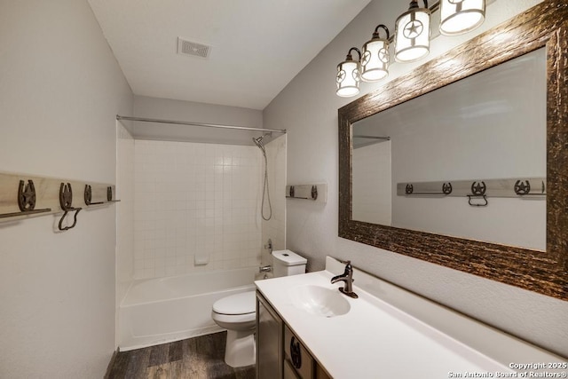 17214 Irongate Rail, San Antonio, TX 78247 - full bath with toilet, wood finished floors, vanity, and shower / bathtub combination