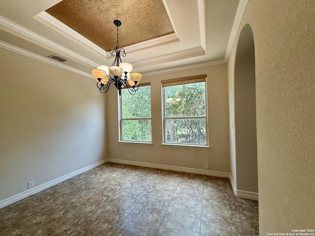 1410 Melanie, San Antonio, TX 78258 - spare room featuring a tray ceiling, a chandelier, crown molding, arched walkways, and a textured wall