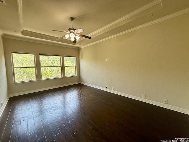 1410 Melanie, San Antonio, TX 78258 - empty room featuring a tray ceiling, ceiling fan, dark wood-style floors, crown molding, and baseboards