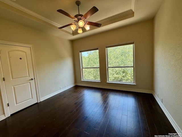 1410 Melanie, San Antonio, TX 78258 - empty room with a tray ceiling, dark wood finished floors, a ceiling fan, baseboards, and a textured wall