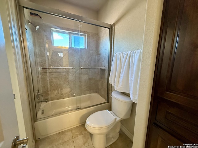 1410 Melanie, San Antonio, TX 78258 - full bath with toilet, bath / shower combo with glass door, tile patterned floors, and baseboards