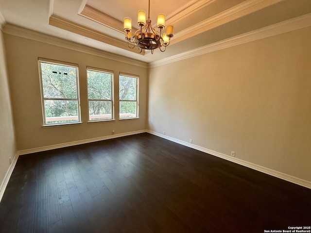 1410 Melanie, San Antonio, TX 78258 - empty room featuring a tray ceiling, a chandelier, dark wood finished floors, ornamental molding, and baseboards