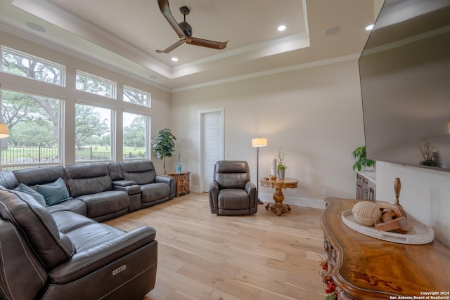 507 Arthur Ct, Spring Branch, TX 78070 - living room with light wood-style floors, ceiling fan, a raised ceiling, crown molding, and baseboards