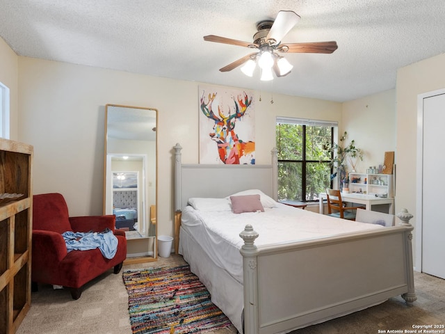 141 E Summit, San Antonio, TX 78212 - carpeted bedroom featuring a textured ceiling and ceiling fan