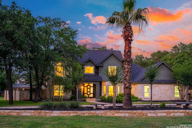 104 Kendall Rdg, Boerne, TX 78015 - traditional home featuring stone siding, stucco siding, a front yard, and a shingled roof