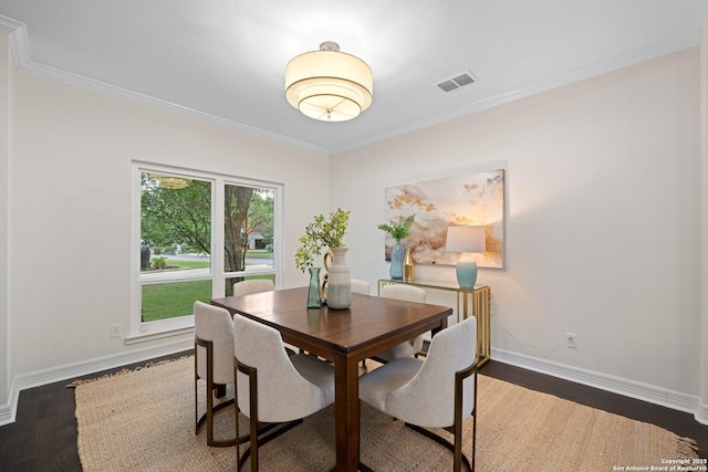 104 Kendall Rdg, Boerne, TX 78015 - dining space featuring wood finished floors, baseboards, and crown molding