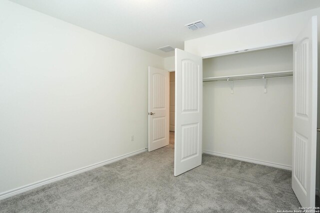 2006 Prometheus Cv, San Antonio, TX 78245 - unfurnished bedroom with carpet floors, a closet, and baseboards