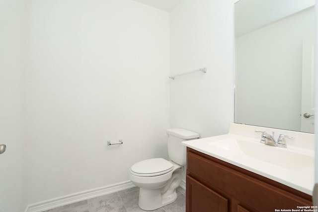 2006 Prometheus Cv, San Antonio, TX 78245 - bathroom with vanity, toilet, and baseboards