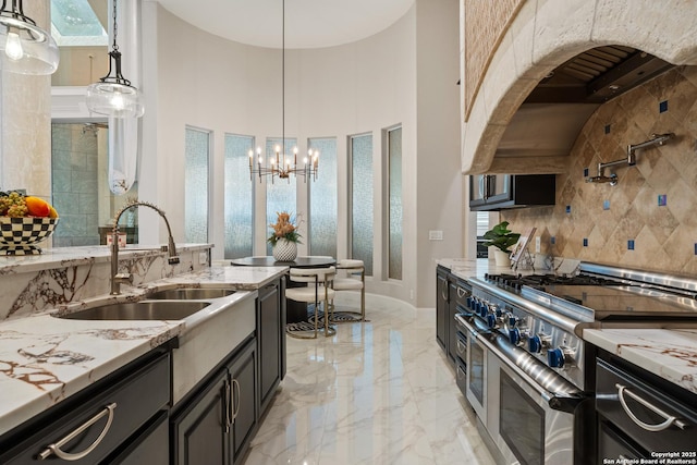 3 Benchwood Cir, San Antonio, TX 78248 - kitchen featuring double oven range, a sink, light stone counters, light marble finish floors, and a high ceiling