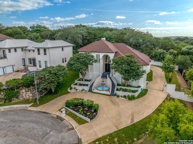 3 Benchwood Cir, San Antonio, TX 78248 - view of front of house featuring stucco siding, stairway, and a chimney