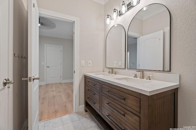 3 Benchwood Cir, San Antonio, TX 78248 - bathroom featuring ornamental molding, double vanity, and baseboards