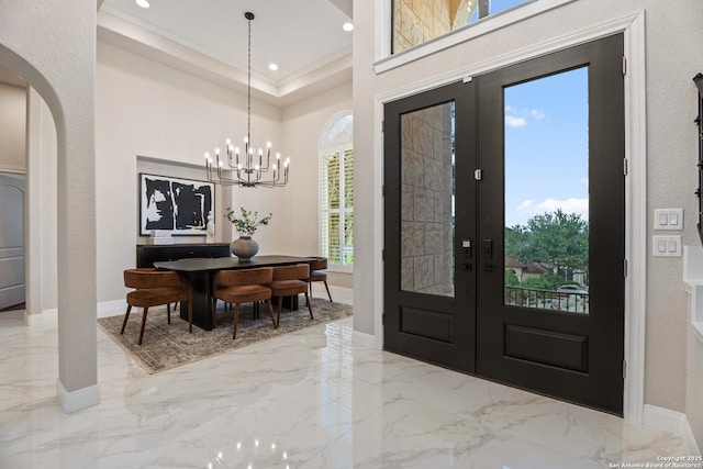 3 Benchwood Cir, San Antonio, TX 78248 - entrance foyer featuring french doors, marble tiled flooring, arched walkways, recessed lighting, and a high ceiling