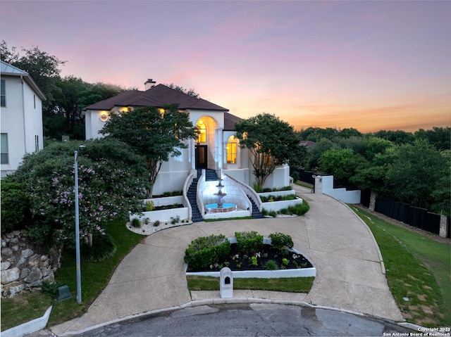 3 Benchwood Cir, San Antonio, TX 78248 - view of front of house with stucco siding and curved driveway
